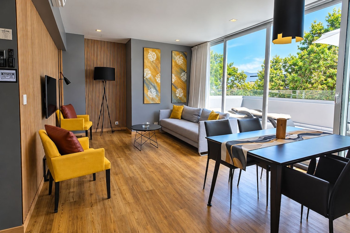 Junior Suite, 1 Bedroom, Terrace, Partial Sea View | Living area | 43-inch TV with cable channels