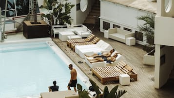 Seasonal outdoor pool, pool loungers