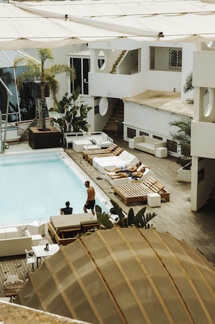 Seasonal outdoor pool, pool loungers. Apartamentos Bora Bora - Adults Only