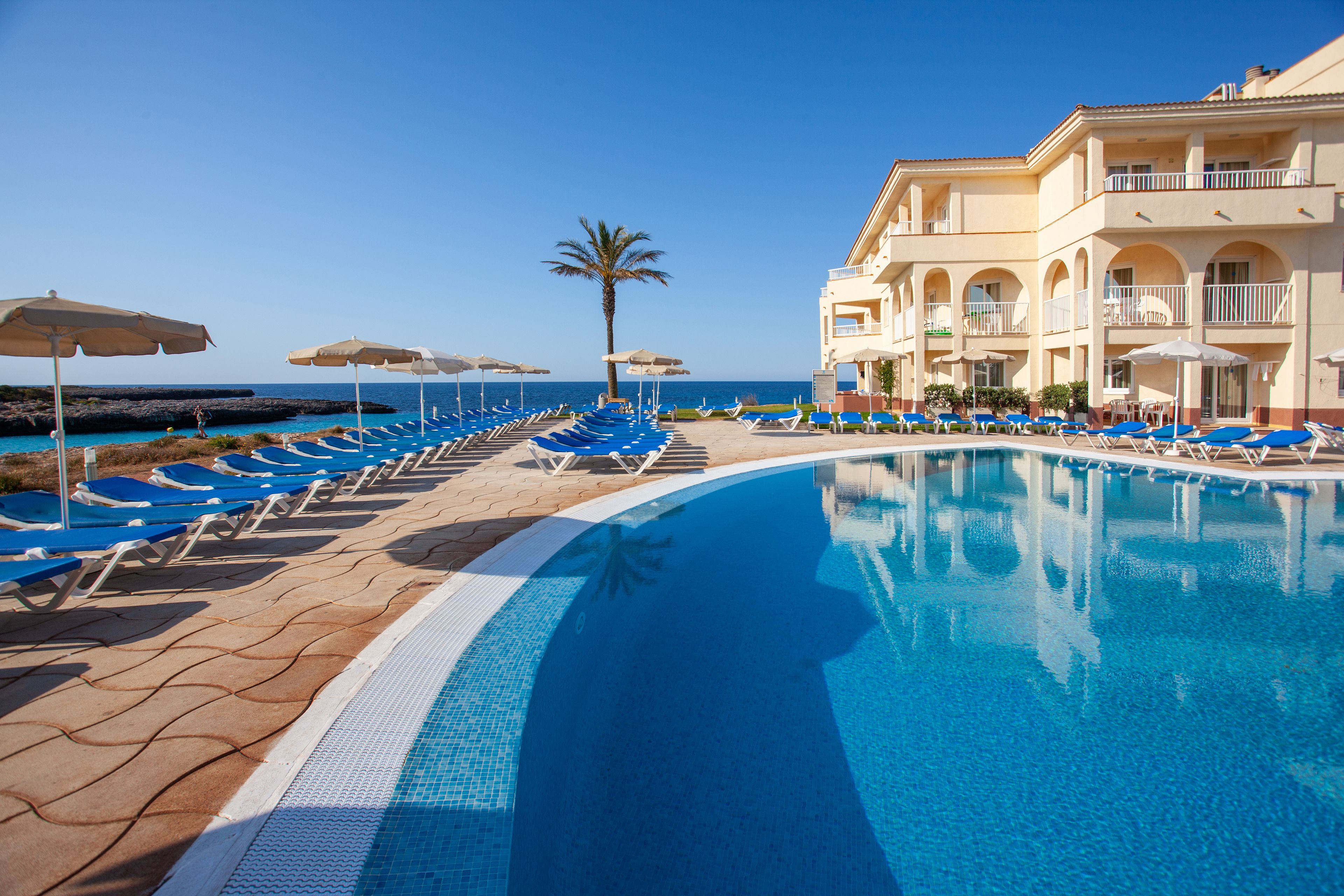 outdoor pool, pool umbrellas, pool loungers