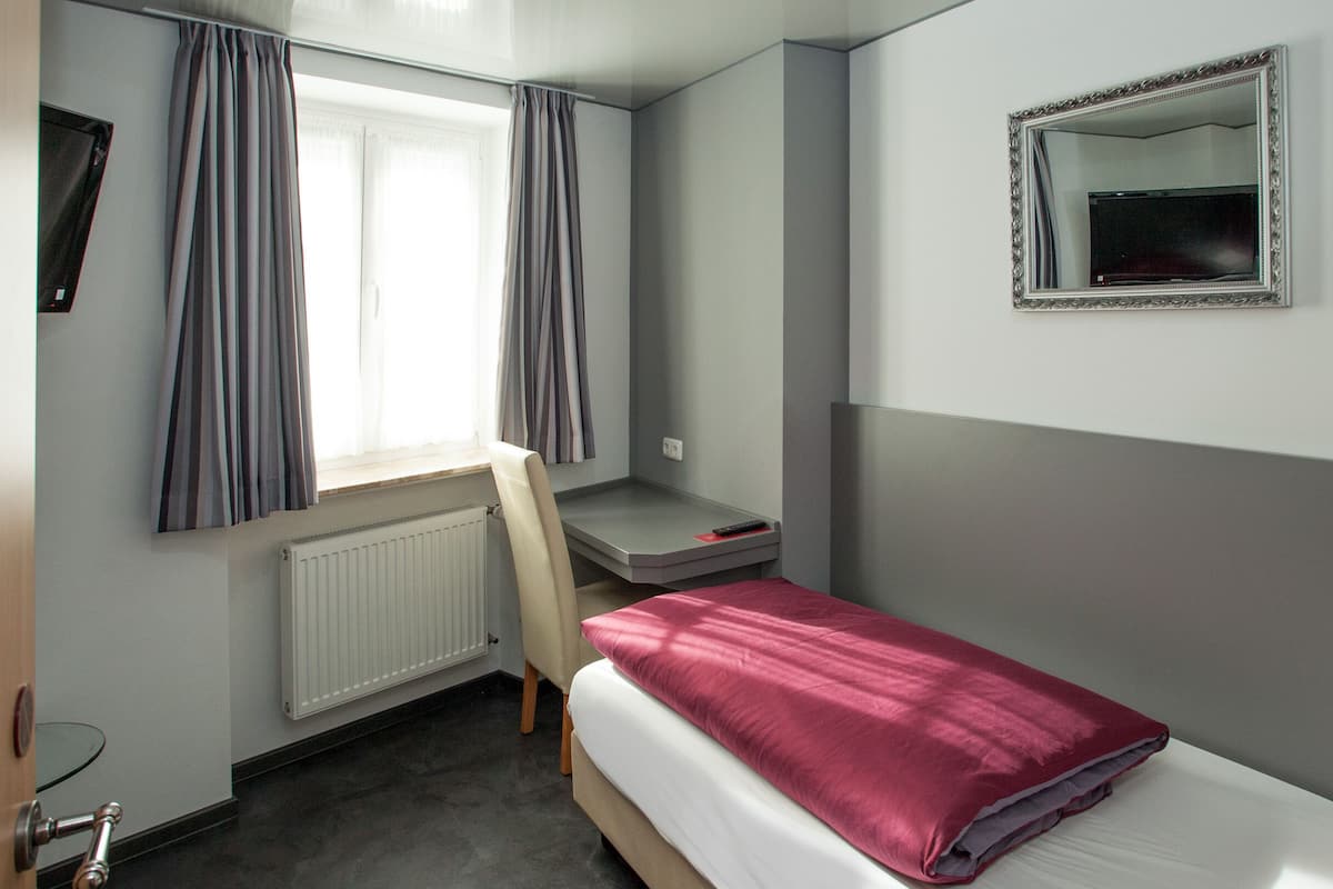 Eenvoudige eenpersoonskamer, privébadkamer | 1 slaapkamer