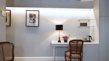 Luxe beddengoed, een minibar, een kluis op de kamer