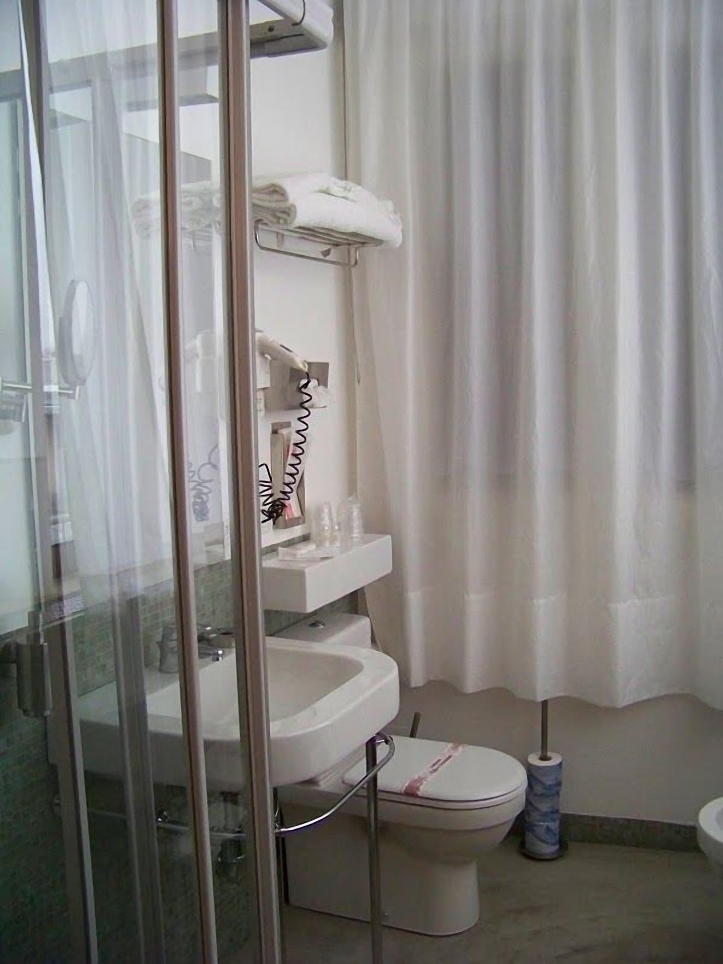 double room single use | bathroom | free toiletries, hair dryer, bathrobes, slippers