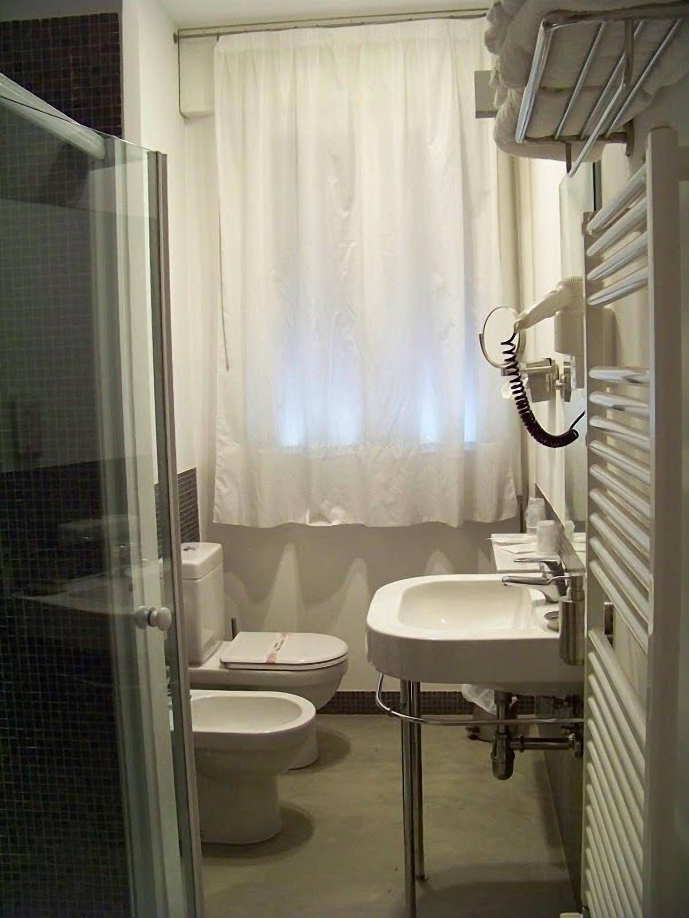 double room single use | bathroom | free toiletries, hair dryer, bathrobes, slippers