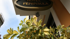 A hotel sign with the name "HOTEL PENINSULA". - Hotel Peninsula (Istanbul)