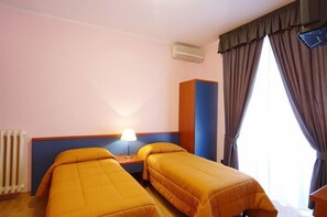 Double or Twin Room | Minibar, desk, cots/infant beds, bed sheets - Buone Vacanze (Rome)