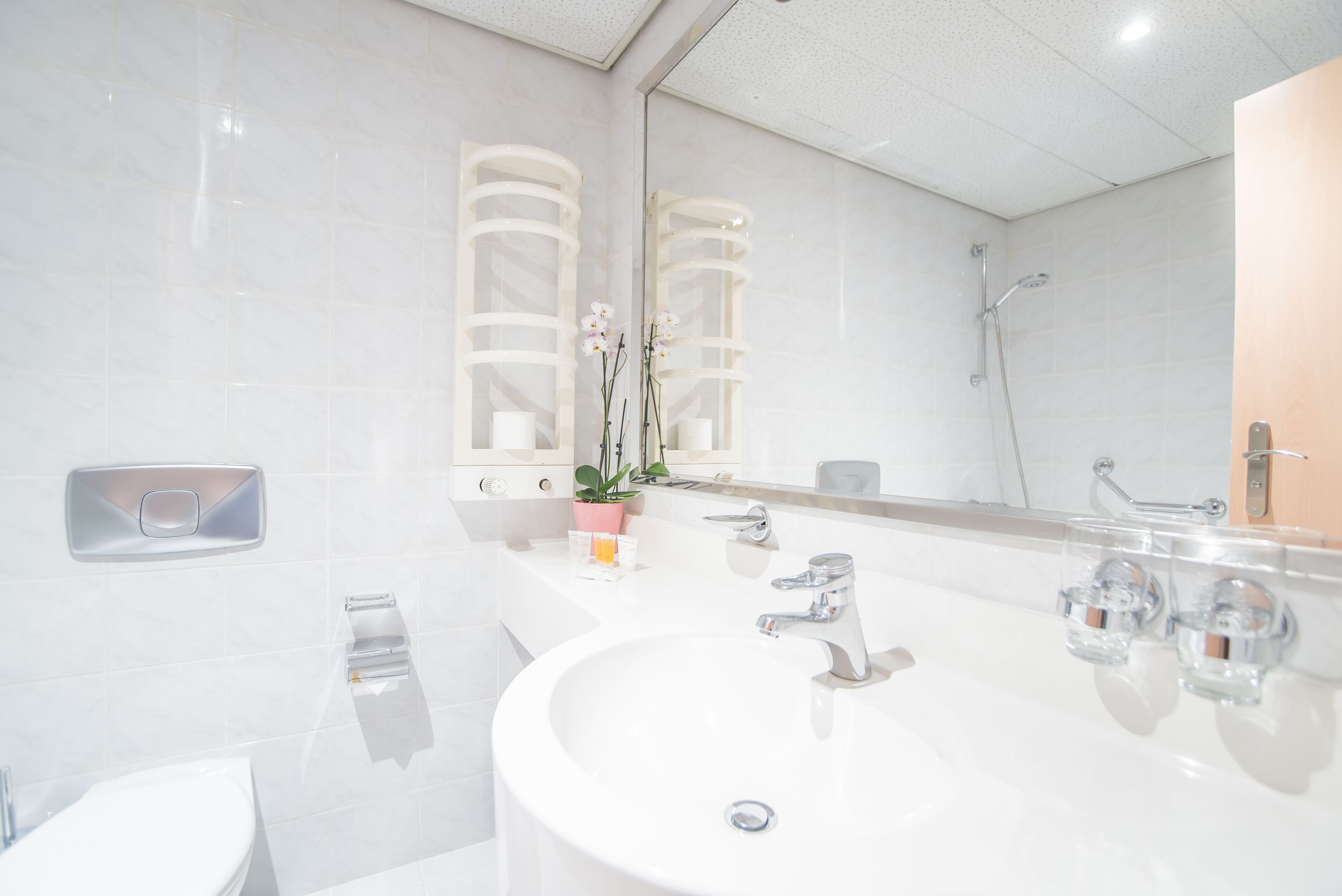 hair dryer, slippers, towels, soap