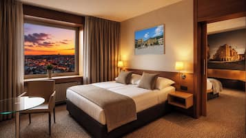 Family Room, 1 Bedroom | Minibar, in-room safe, desk, laptop workspace