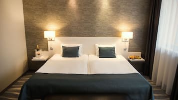 1 habitación, ropa de cama hipoalergénica y minibar