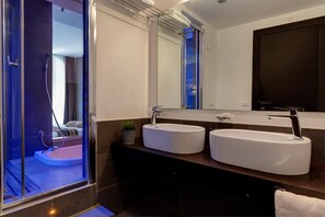 Shower, free toiletries, hair dryer, slippers