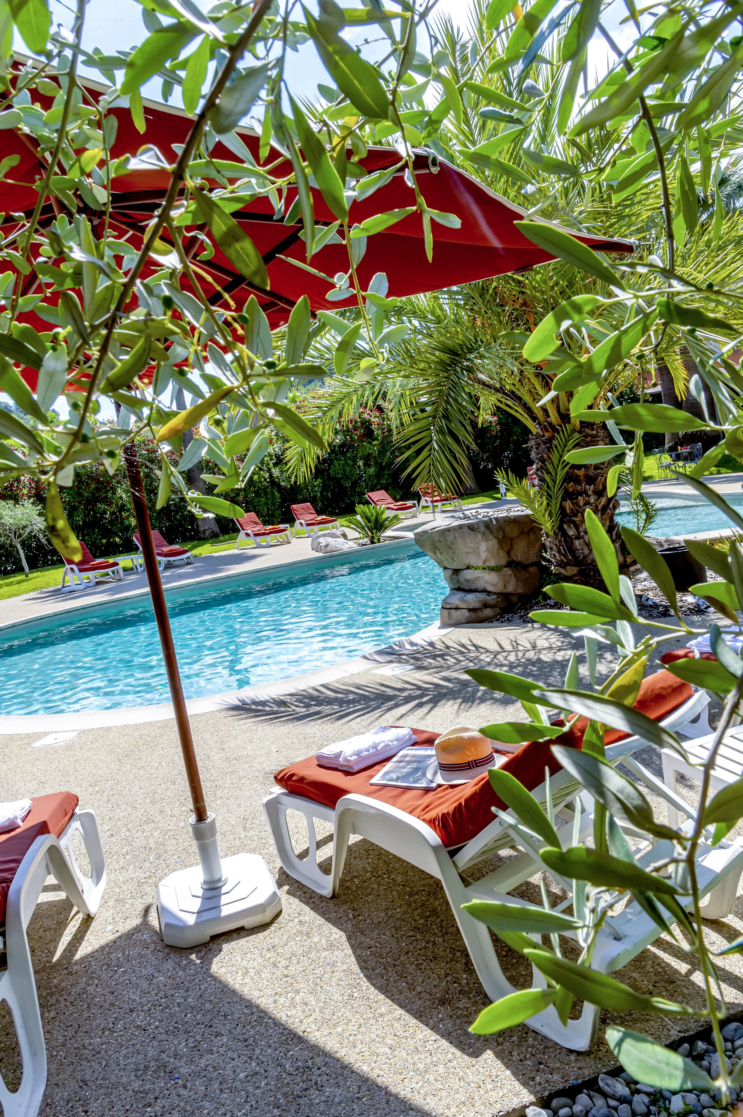 seasonal outdoor pool, pool umbrellas, pool loungers