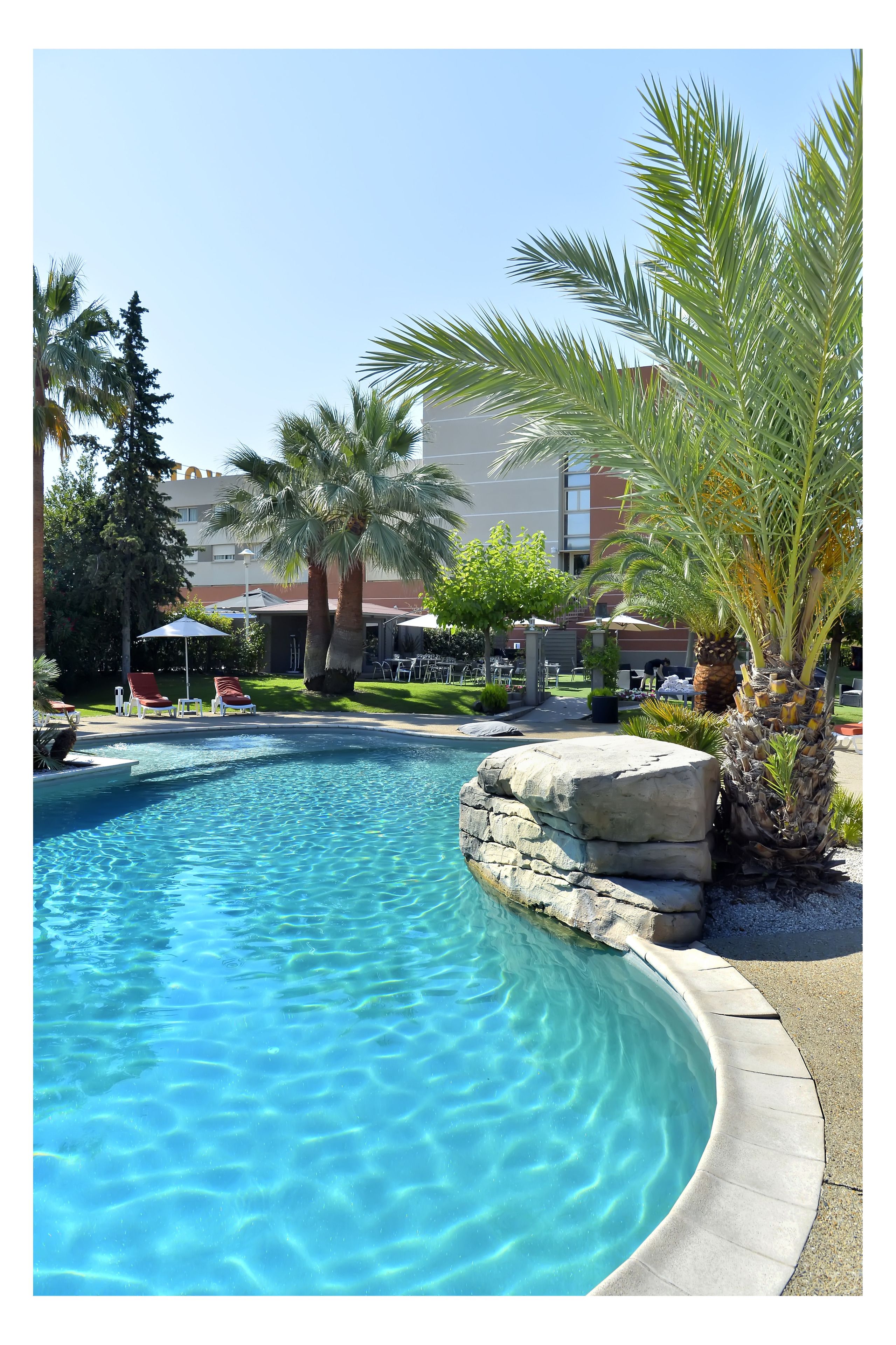 seasonal outdoor pool, pool umbrellas, pool loungers