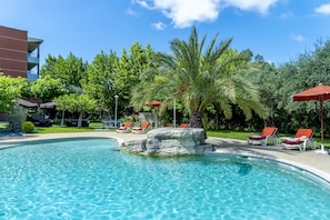Seasonal outdoor pool, pool umbrellas, sun loungers