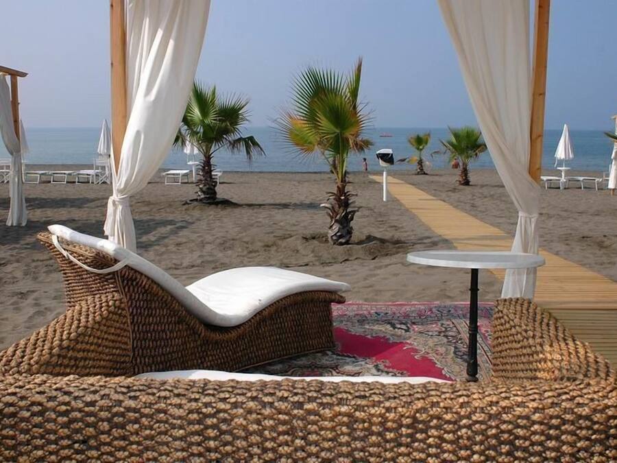 Private beach, white sand, sun loungers, beach umbrellas