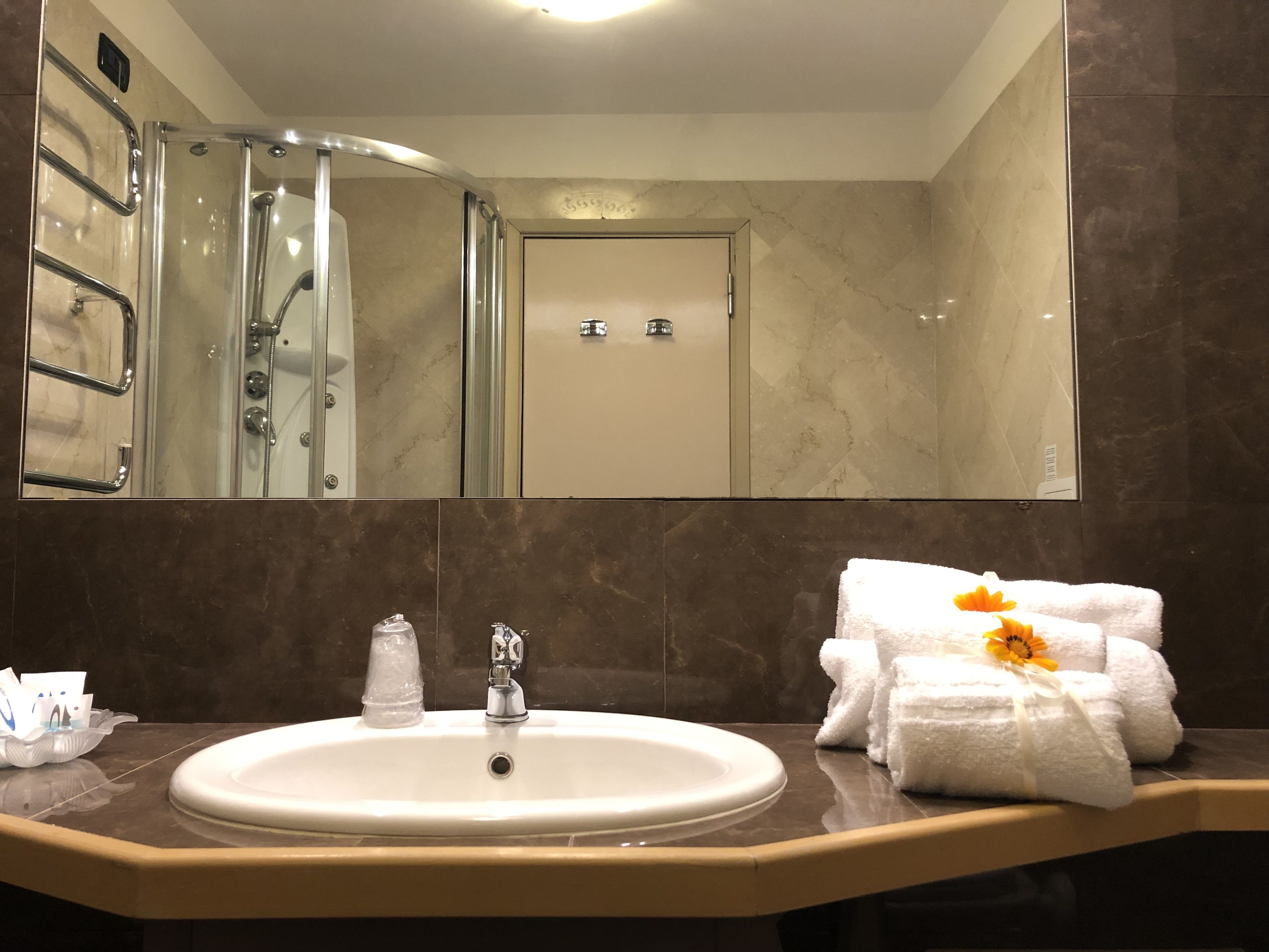 shower, free toiletries, hair dryer, towels