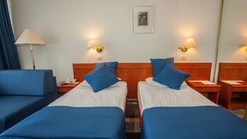 1 habitación, camas con pillow-top y minibar