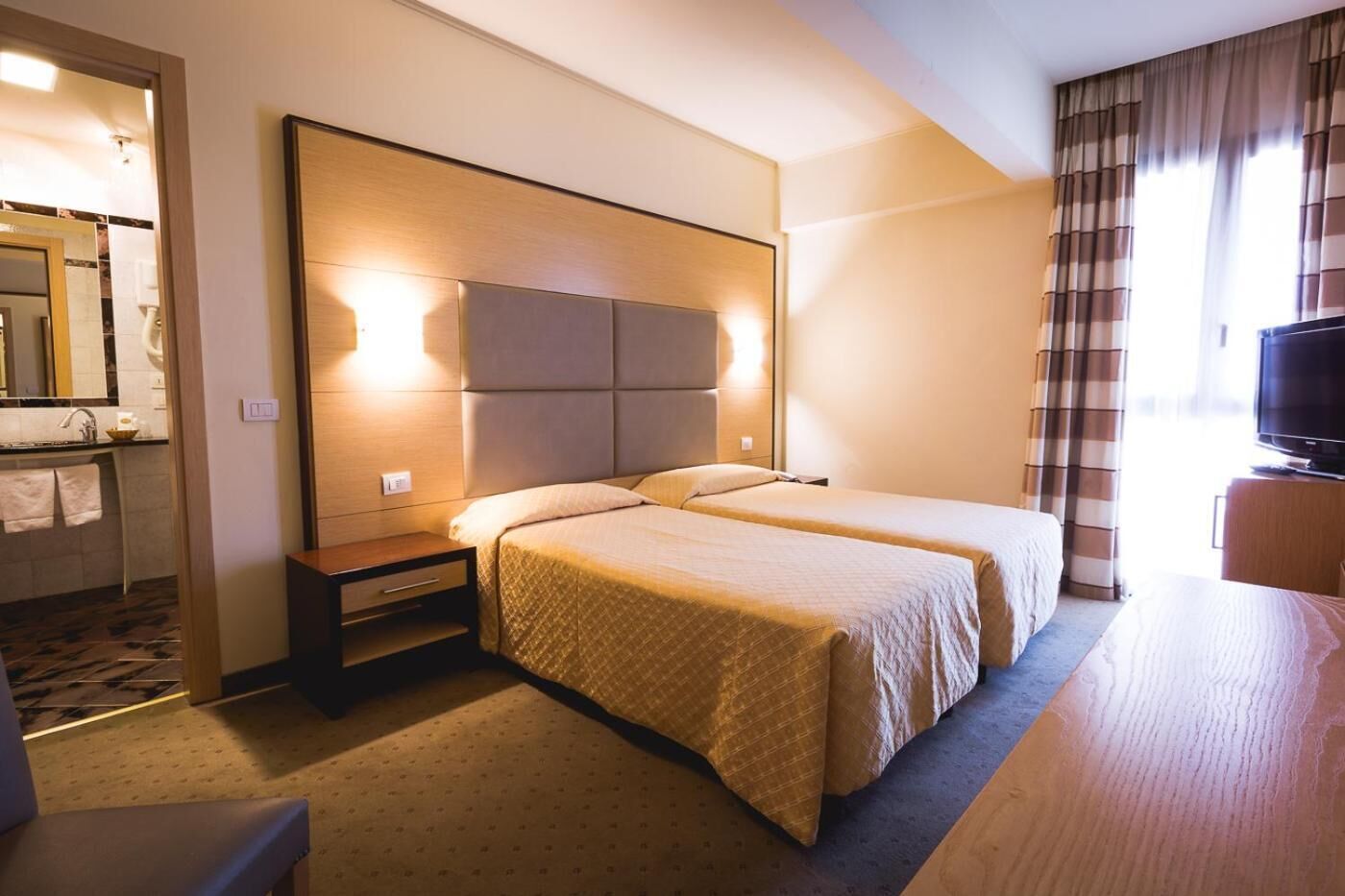 hypo-allergenic bedding, in-room safe, desk, blackout curtains