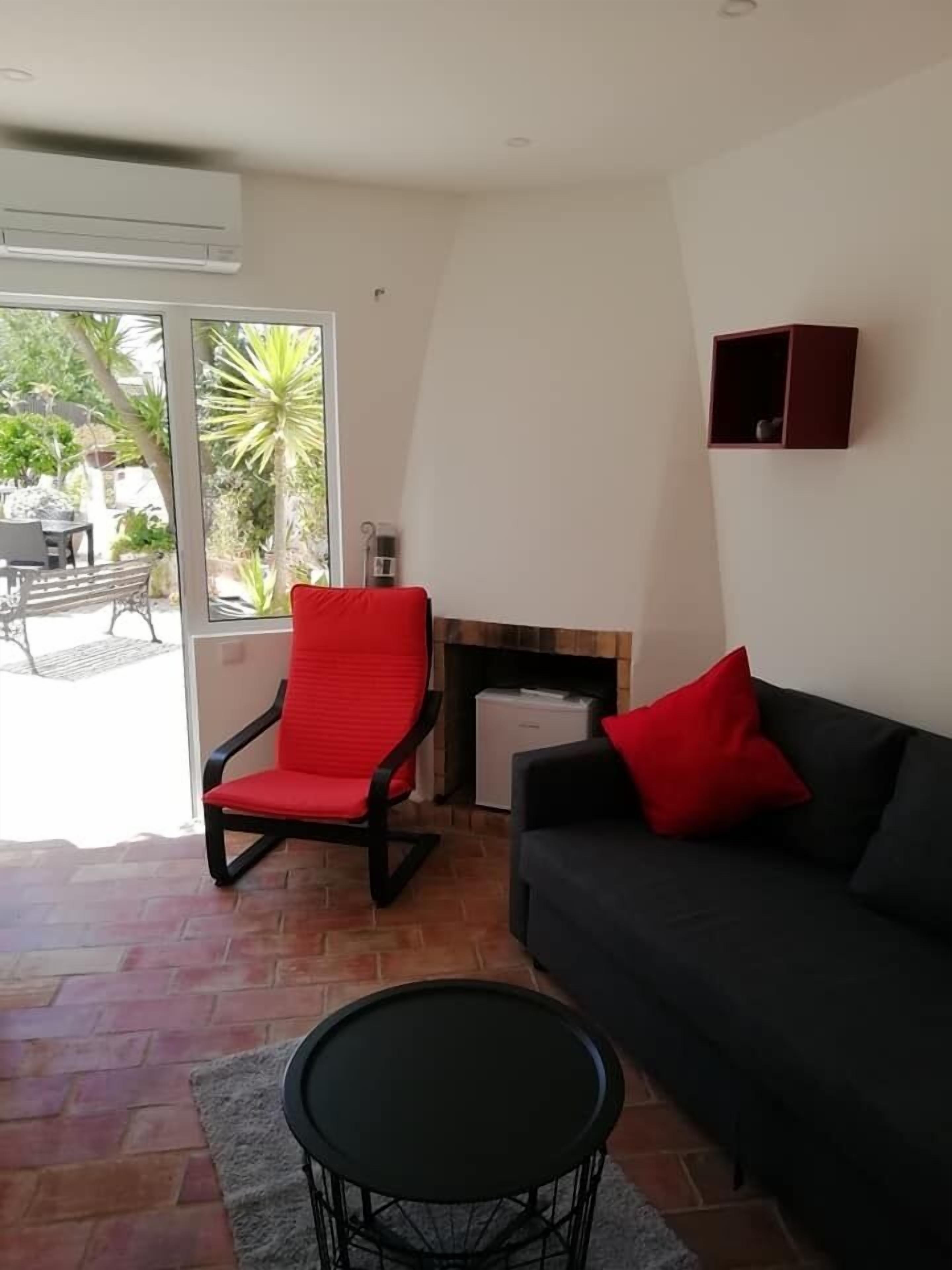 Family Suite | Living area | Plasma TV