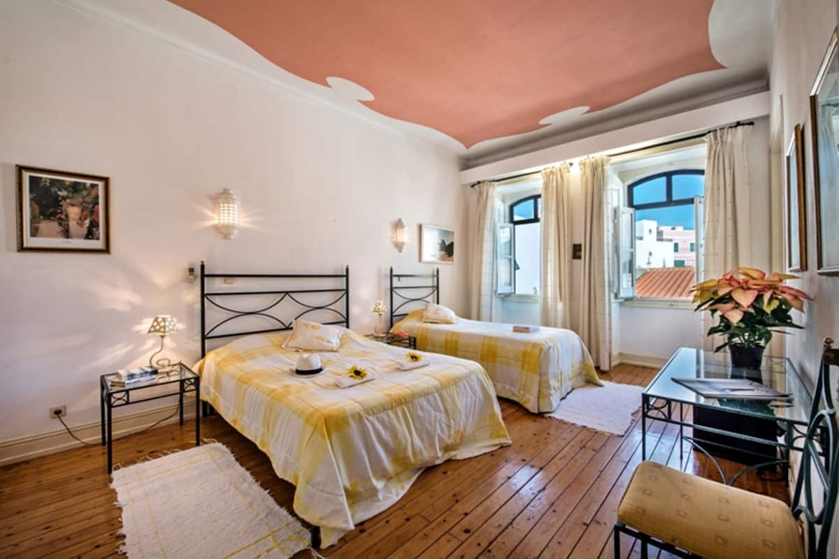 Family Triple Room, 1 Bedroom | Minibar, individually decorated, individually furnished, blackout drapes