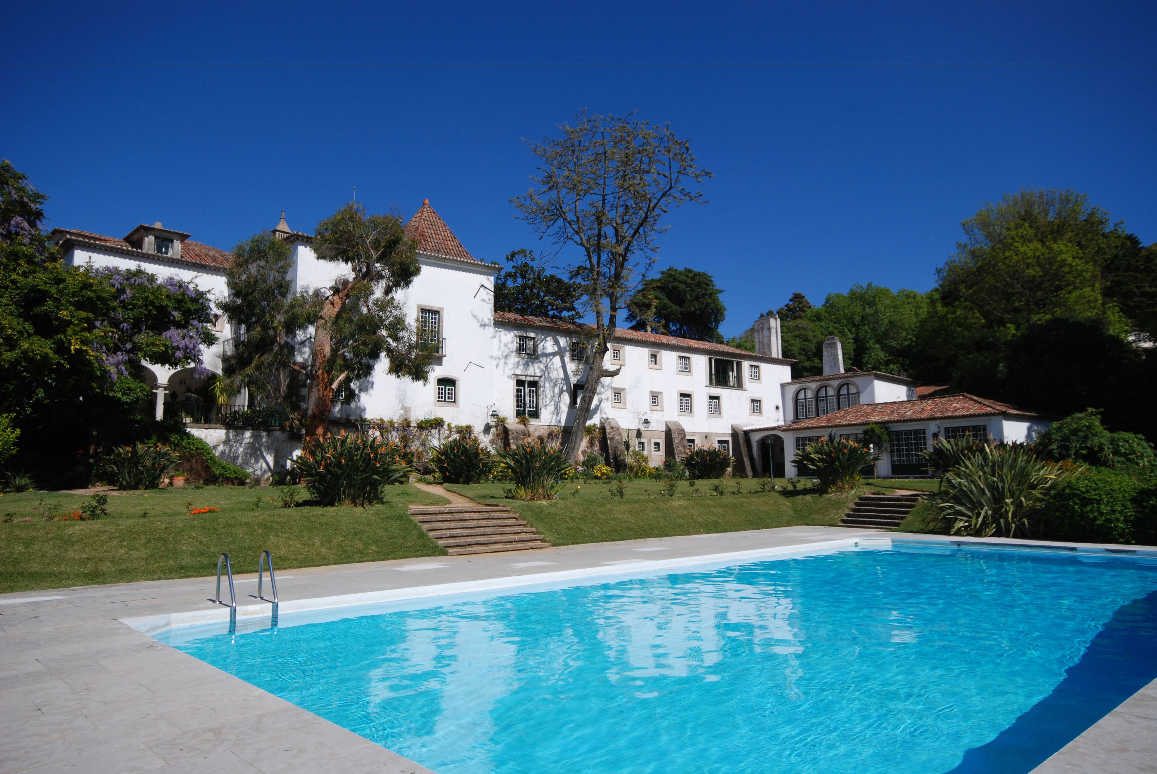 Outdoor pool, pool umbrellas, pool loungers