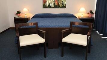 Single Room | Minibar, in-room safe, iron/ironing board, free cribs/infant beds