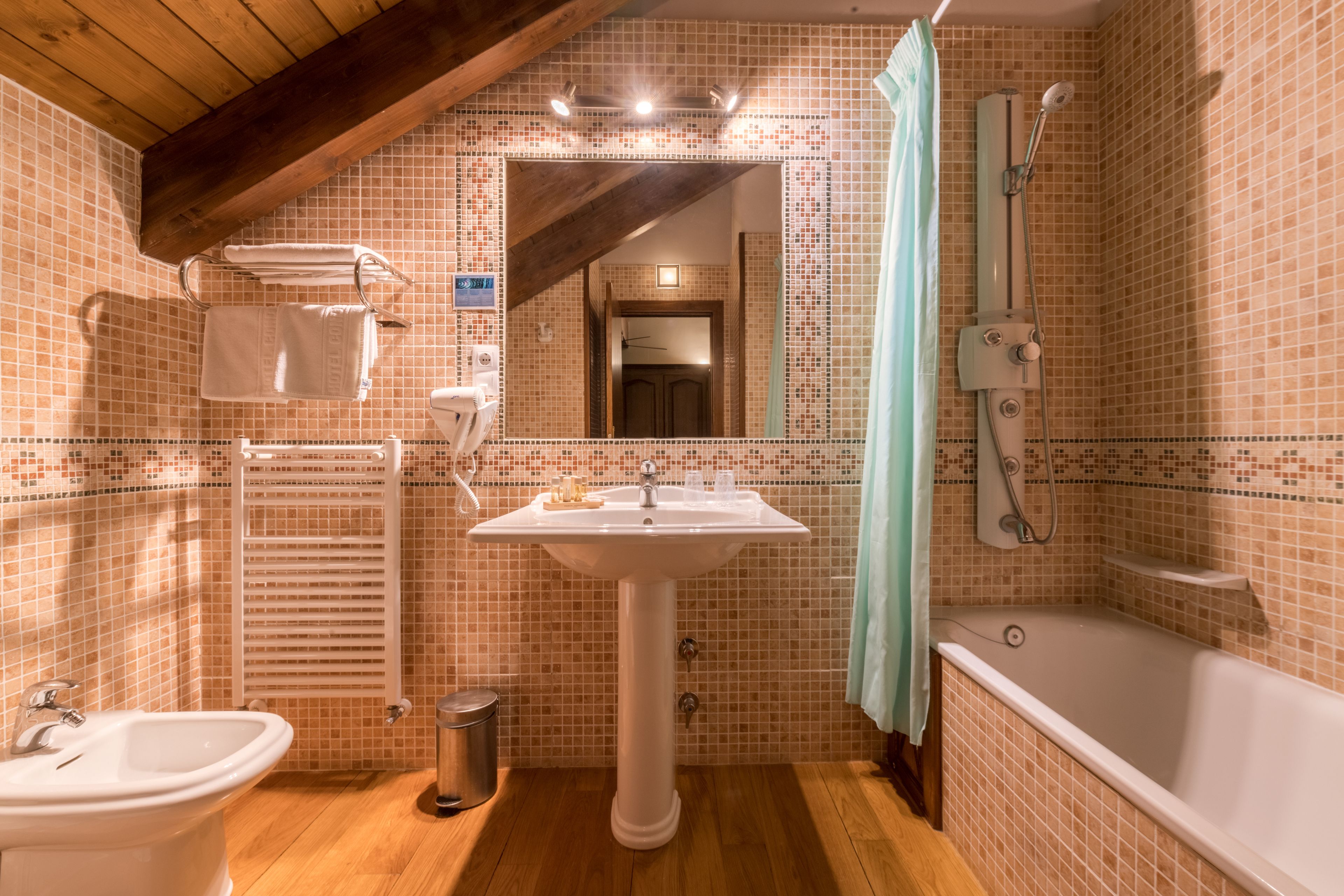 deep-soaking bathtub, hair dryer, towels