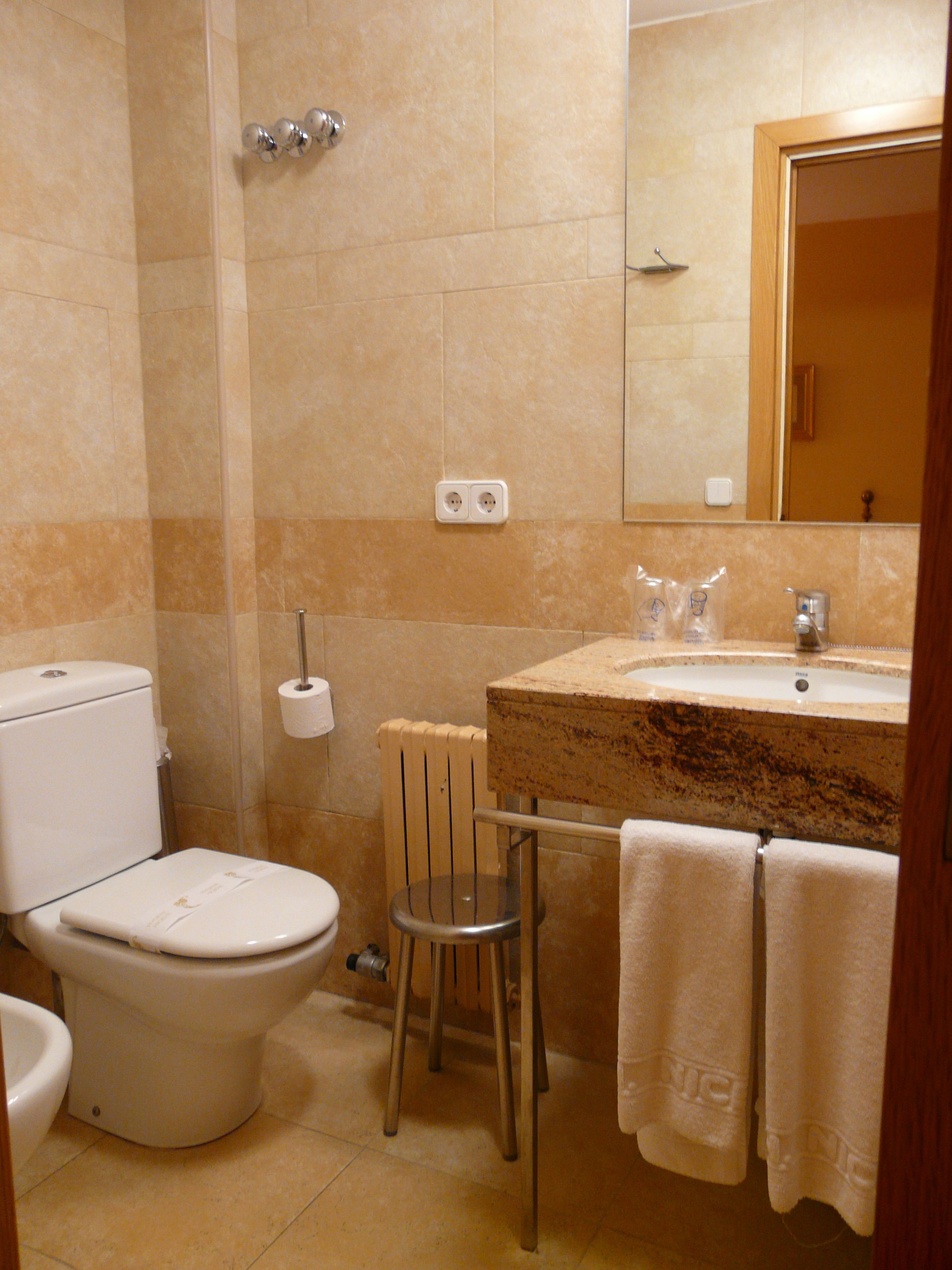 economy double room | bathroom | hair dryer, towels
