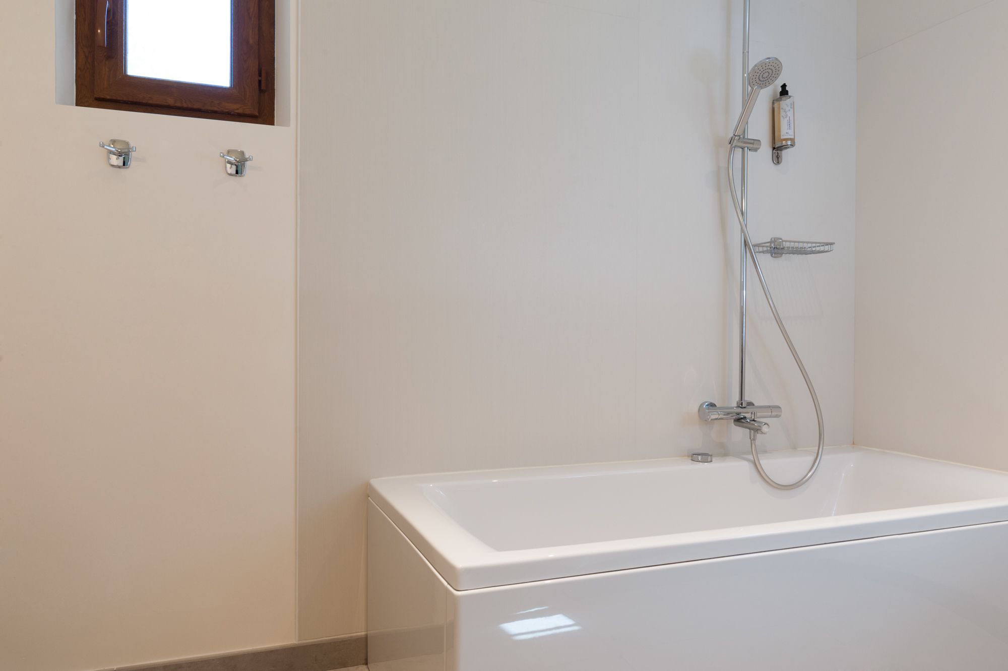 superior room | bathroom | rainfall showerhead, hair dryer, towels