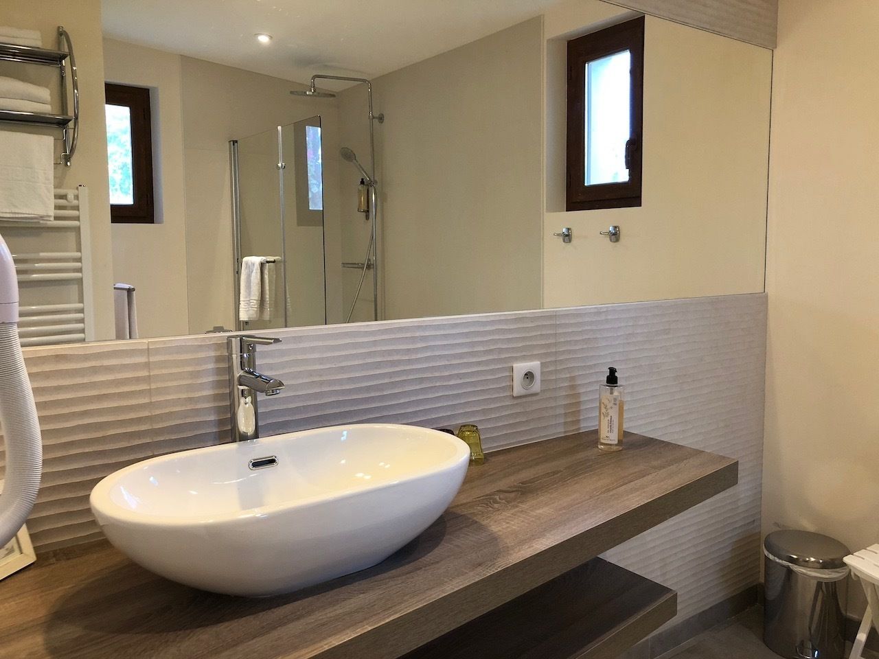 superior room | bathroom | rainfall showerhead, hair dryer, towels