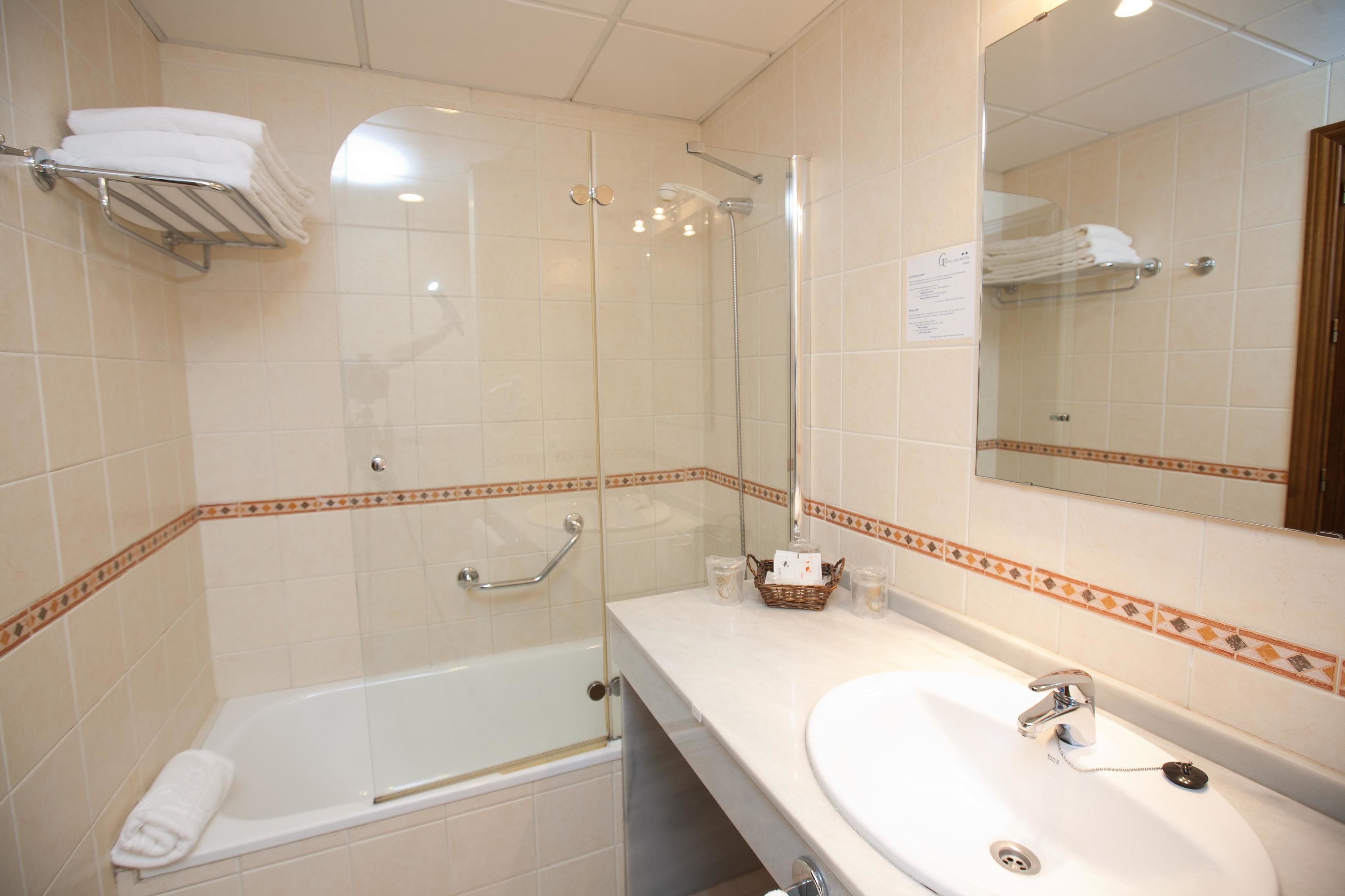 hair dryer, bidet, towels