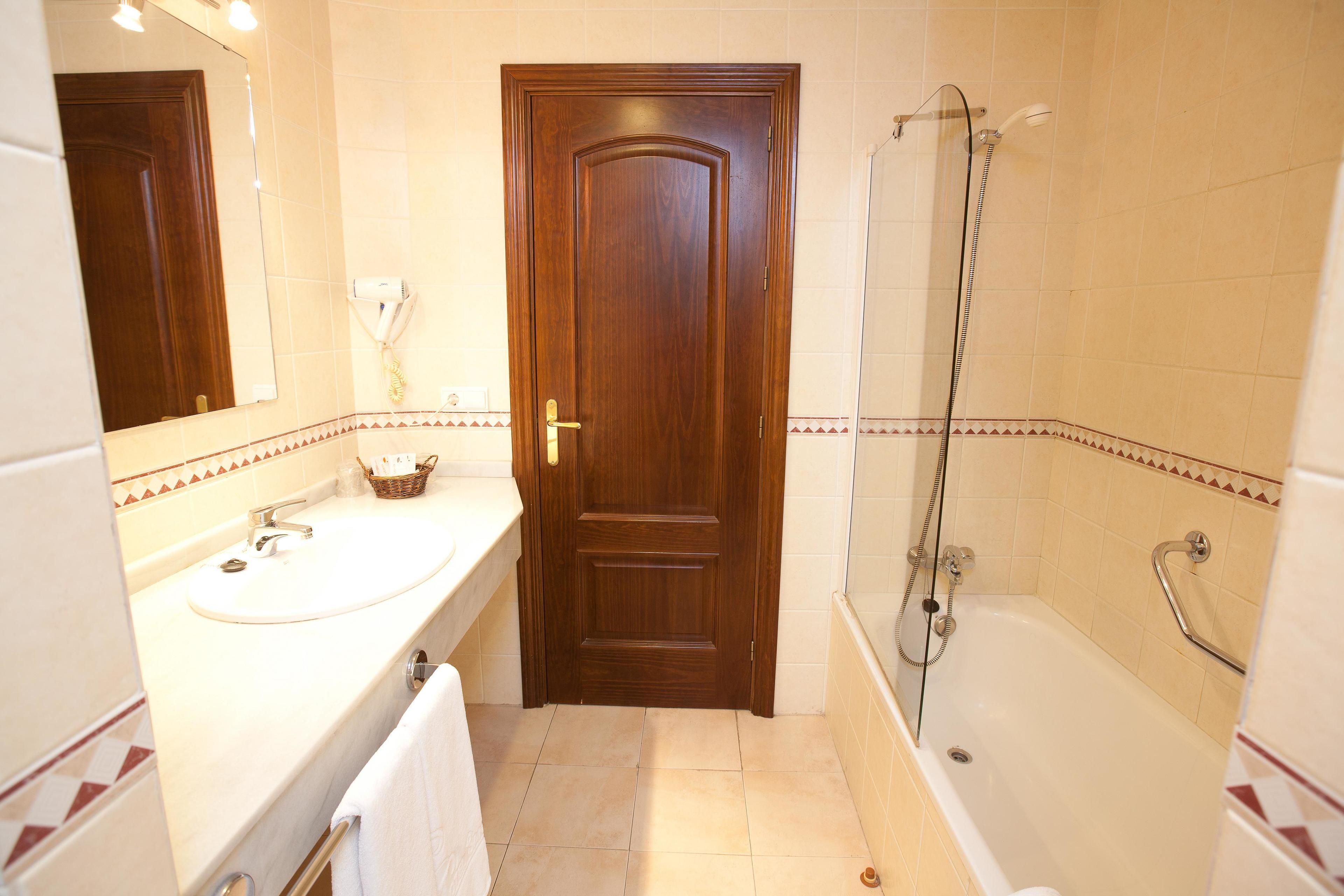 hair dryer, bidet, towels