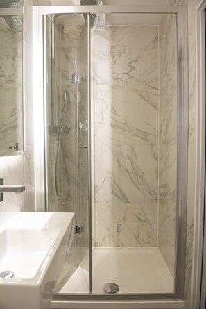 Shower, free toiletries, hair dryer, slippers
