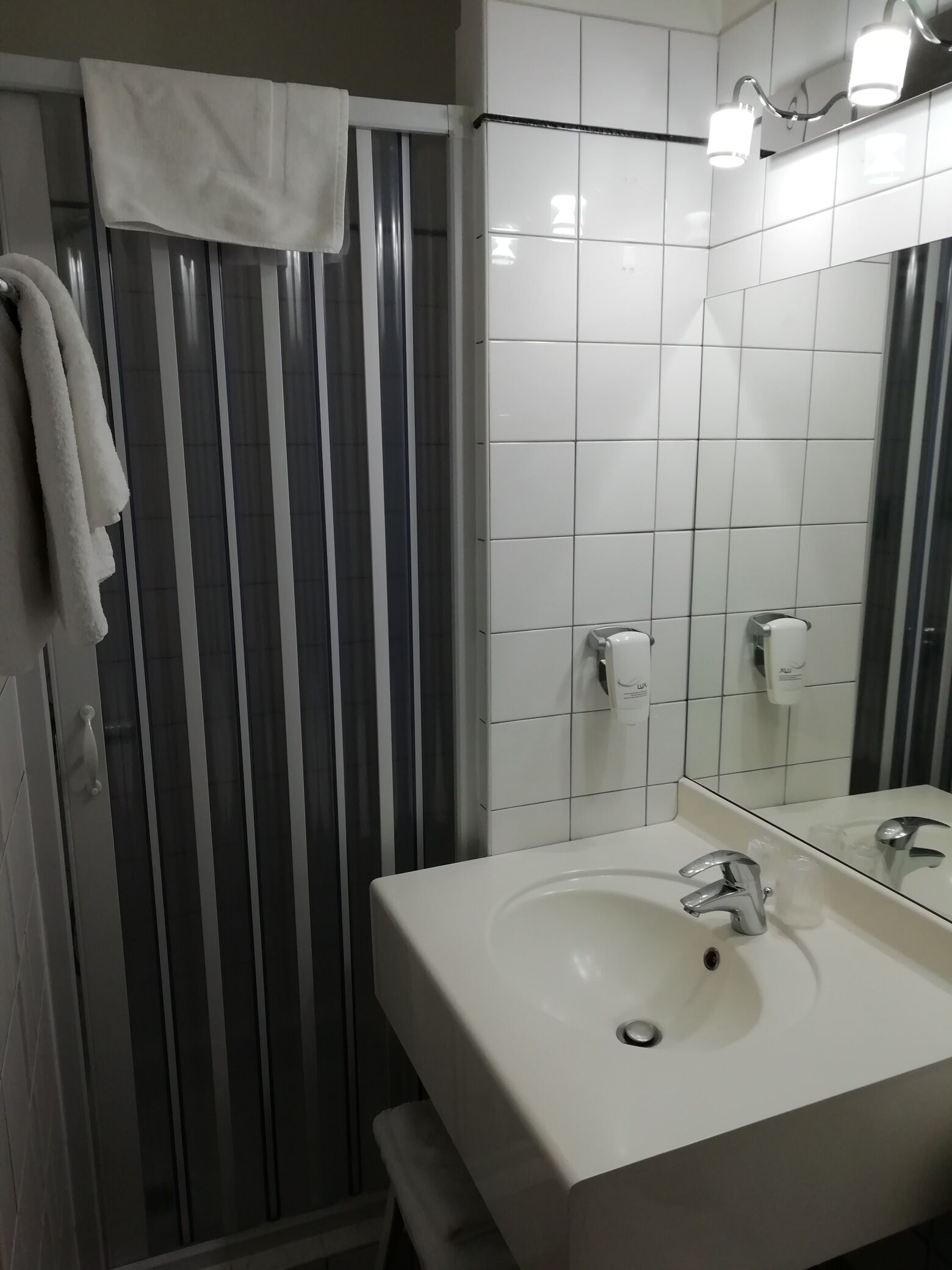 classic double room single use | bathroom | hair dryer, towels, soap, shampoo