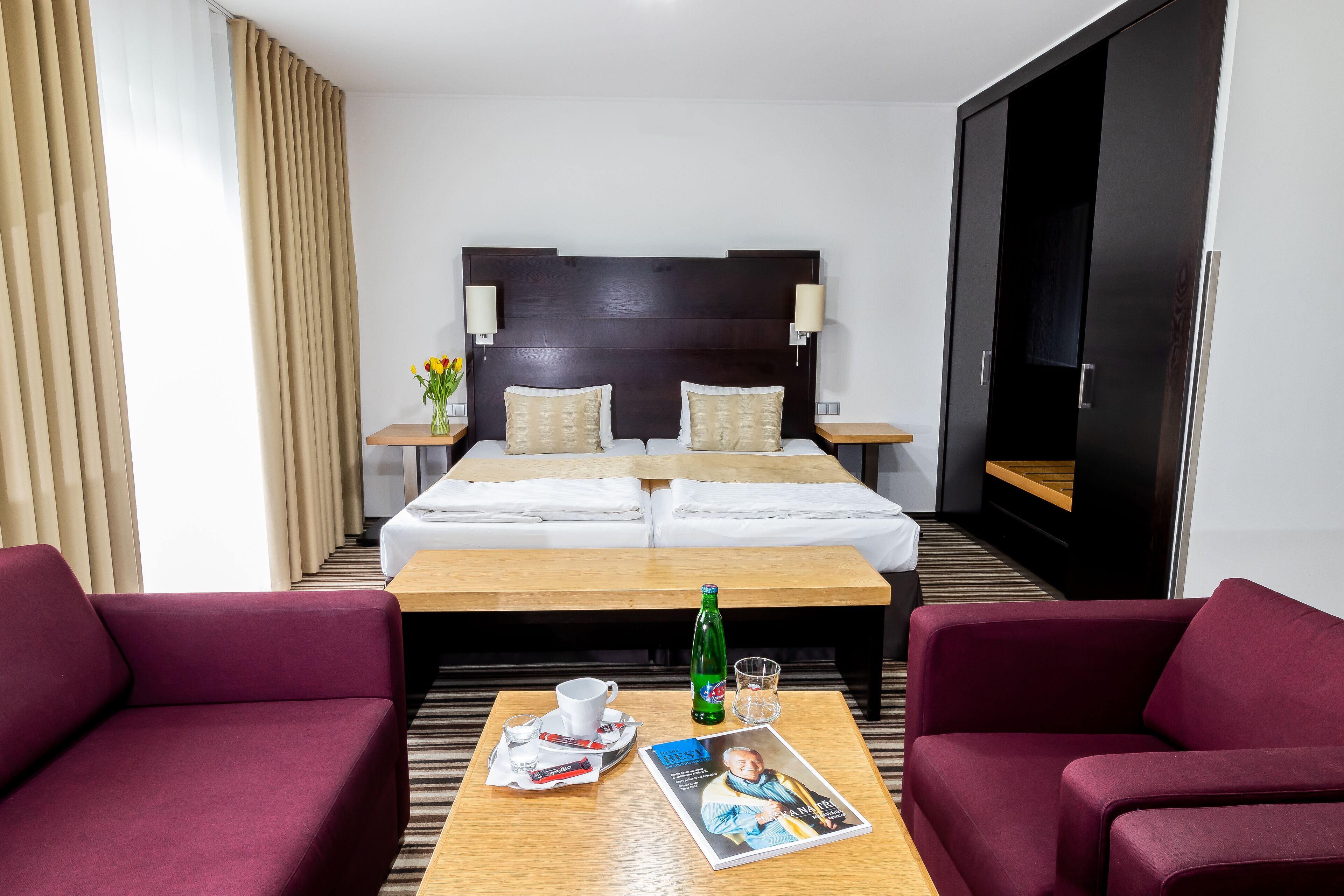 junior suite | 1 bedroom, in-room safe, desk, blackout curtains
