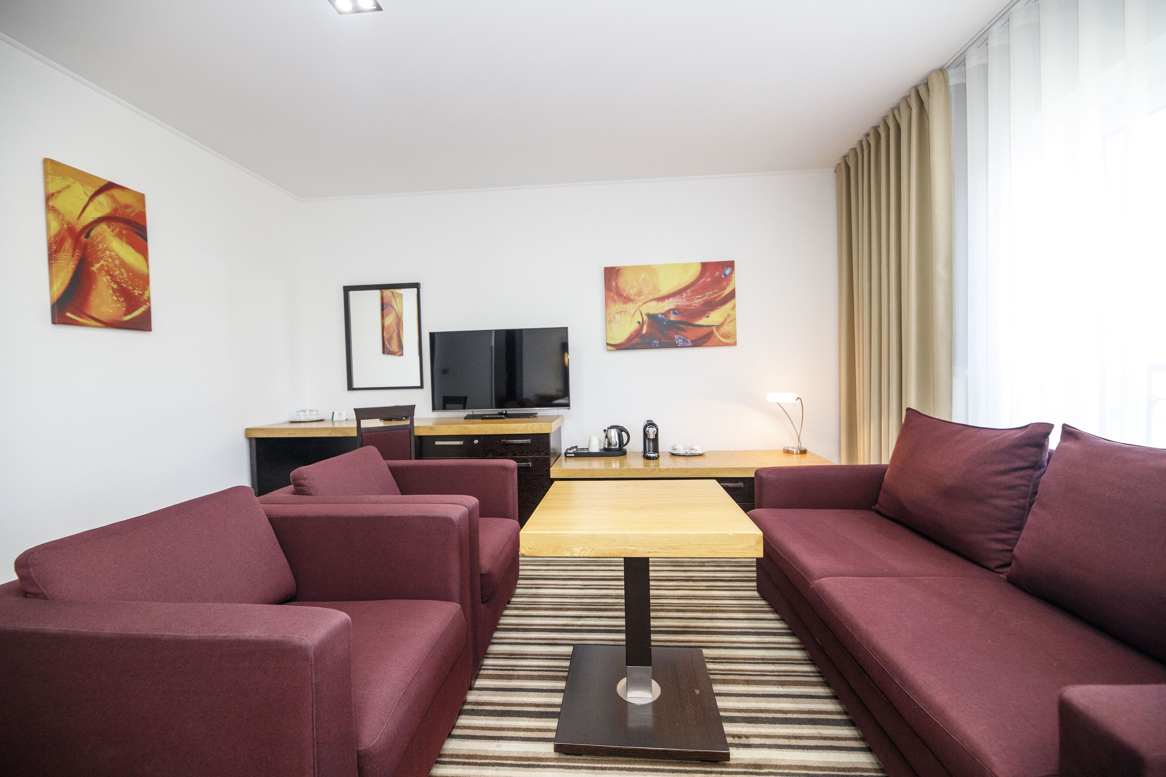 junior suite | living area | tv