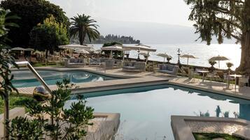 Indoor pool, outdoor pool, pool umbrellas, sun loungers