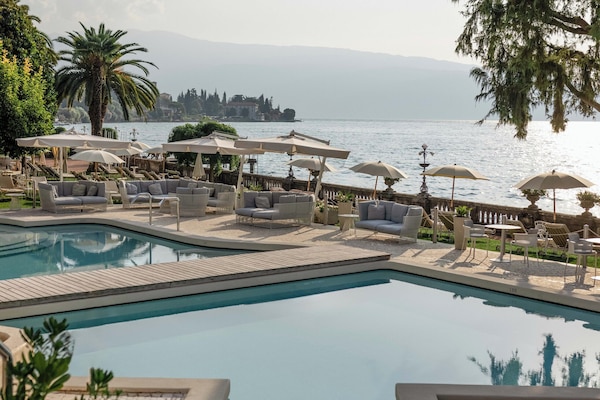Indoor pool, outdoor pool, pool umbrellas, sun loungers