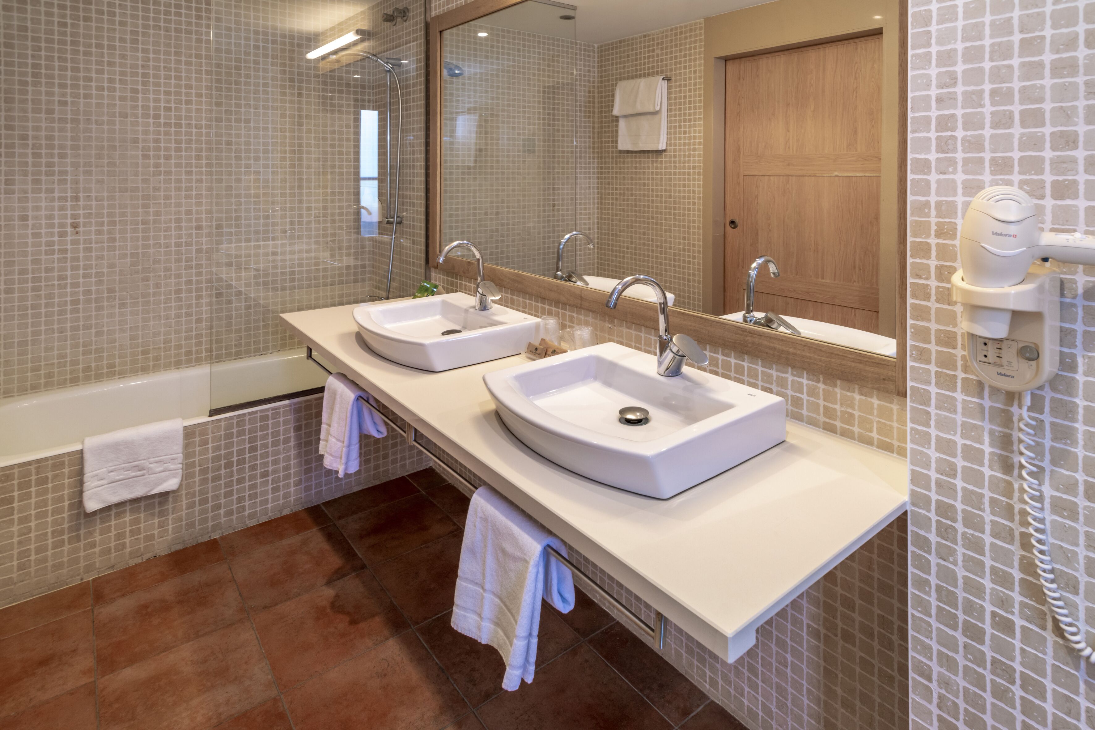 hair dryer, towels, soap, shampoo