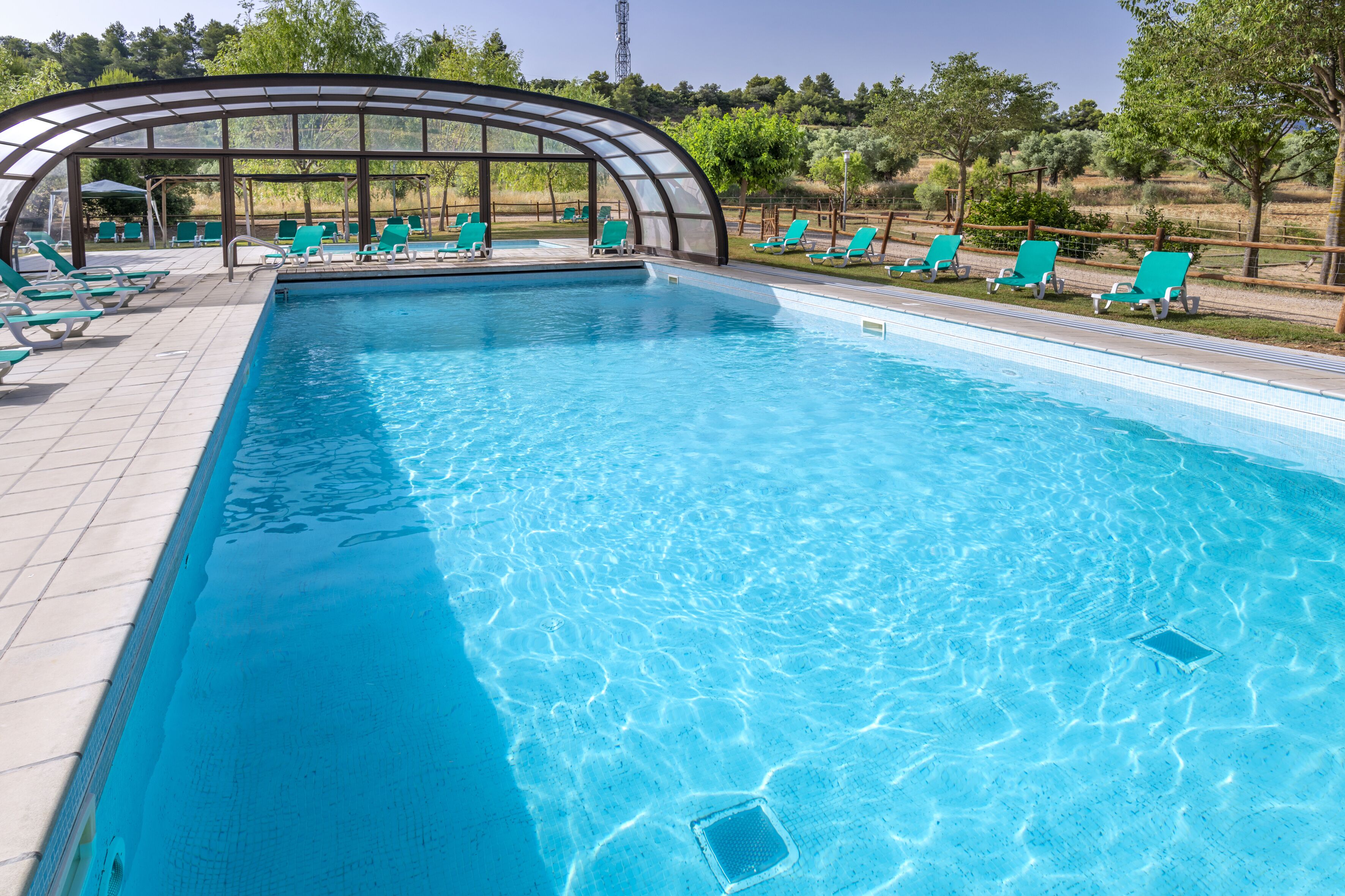 indoor pool, outdoor pool, pool loungers