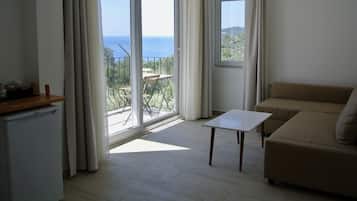 Deluxe Room, 1 Queen Bed with Sofa bed, Partial Sea View | In-room safe, free WiFi, bed sheets
