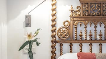 Luxe beddengoed, een minibar, een kluis op de kamer, een bureau