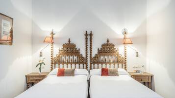 Ropa de cama de alta calidad, minibar, caja fuerte y escritorio