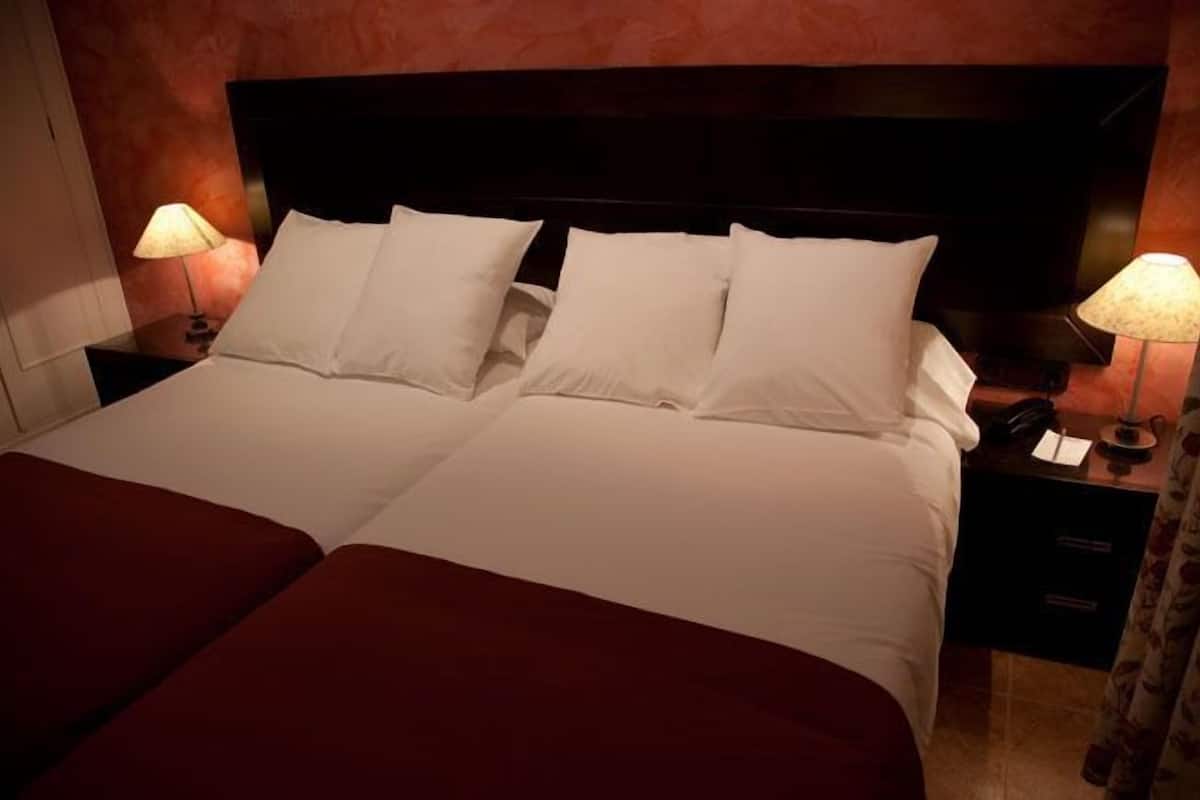 Premium bedding, in-room safe, desk, free WiFi