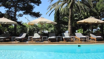 Outdoor pool, pool umbrellas, pool loungers