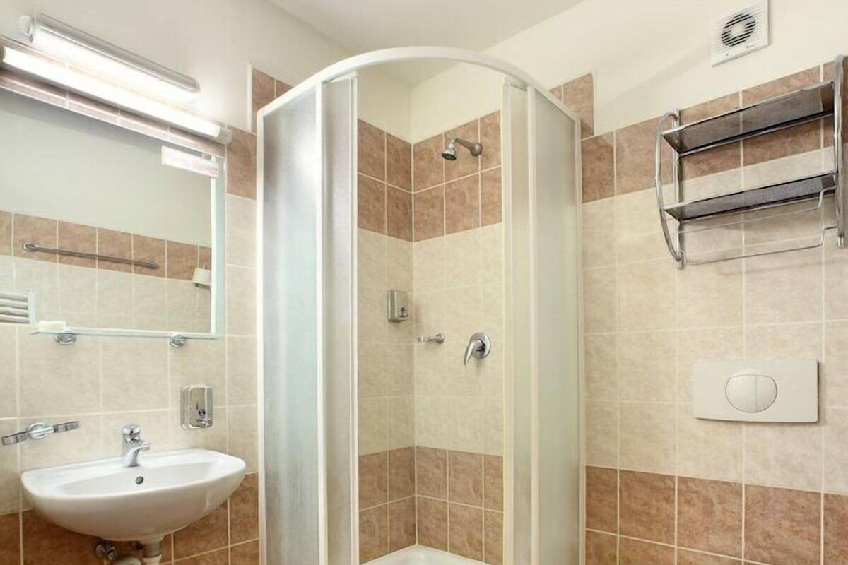 Bathroom | Shower, hair dryer, towels