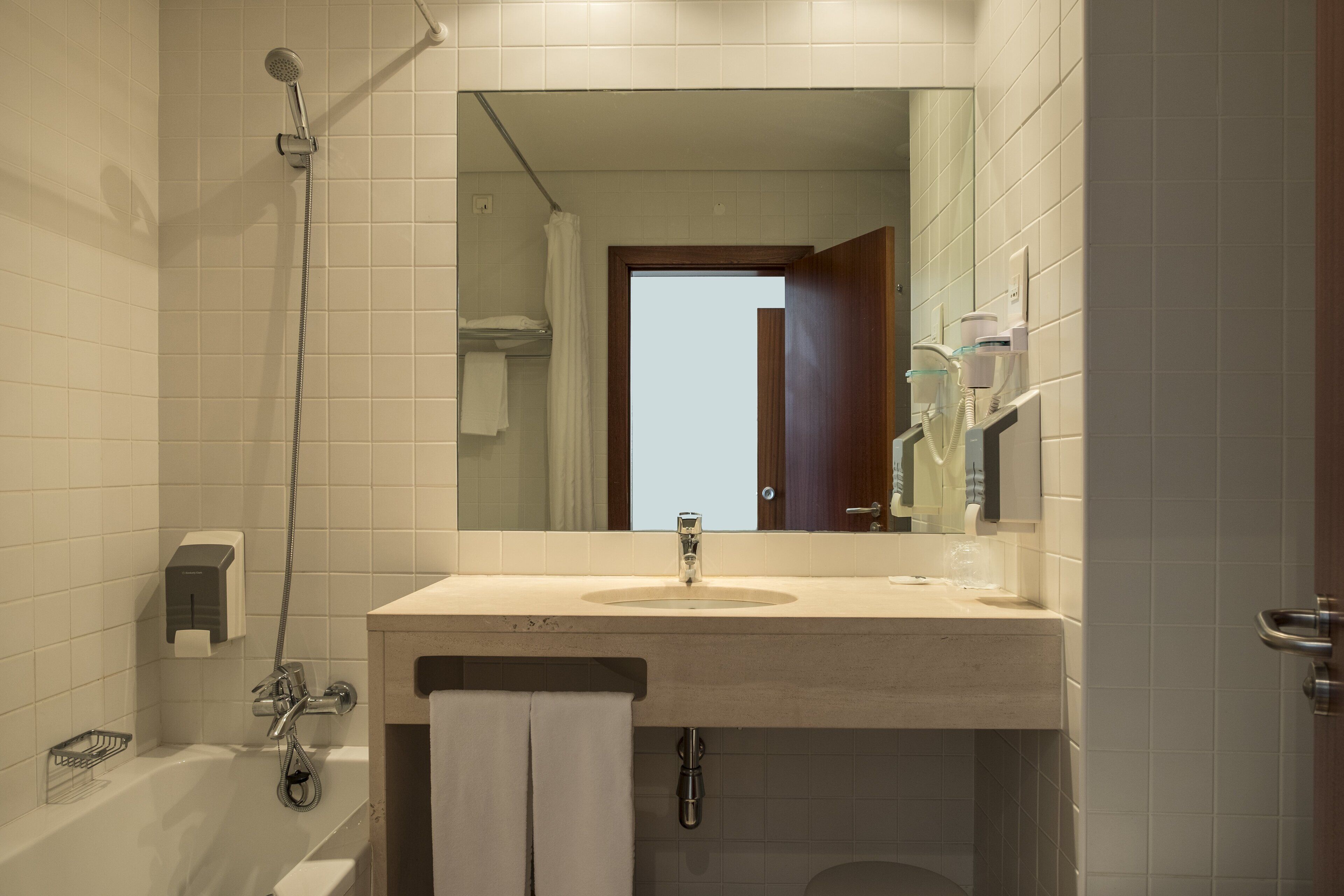 shower, eco-friendly toiletries, hair dryer, towels