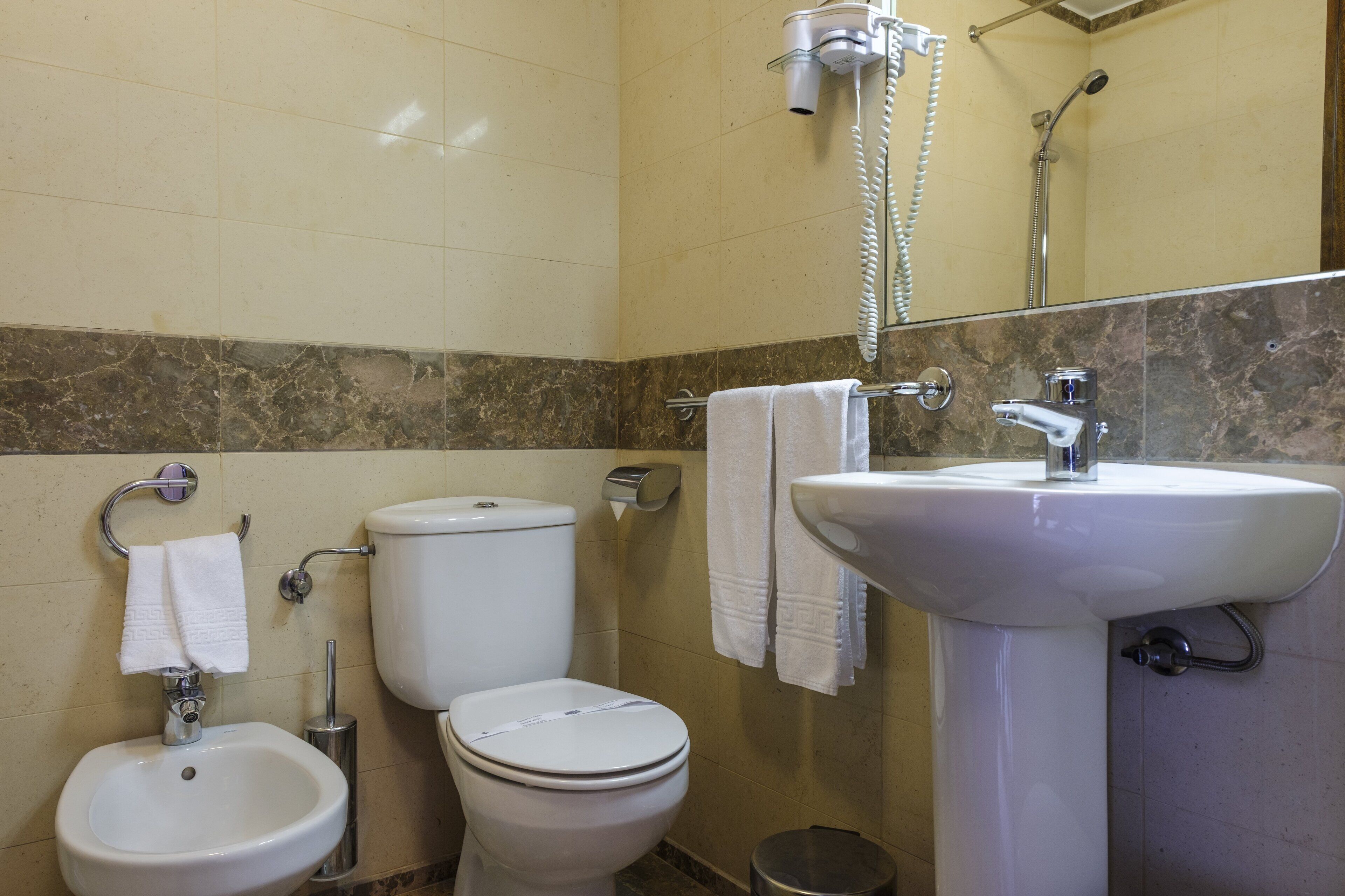 shower, eco-friendly toiletries, hair dryer, towels