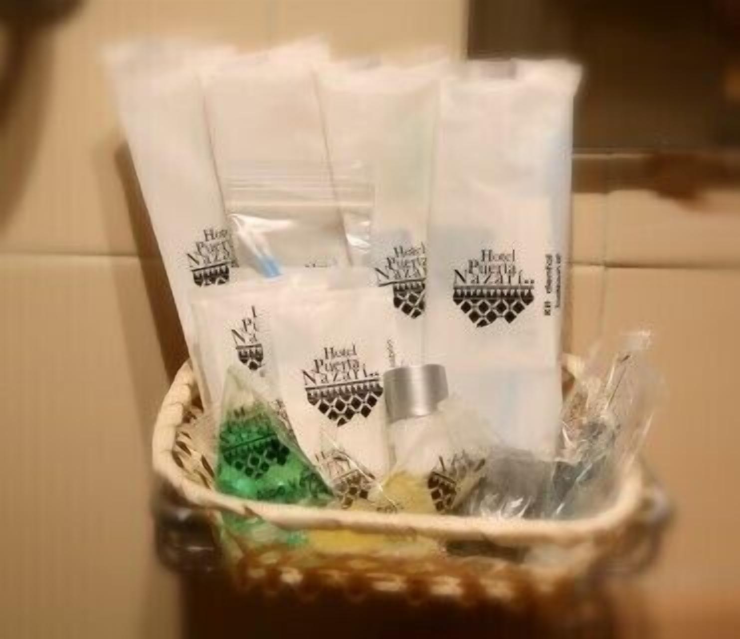 bathtub, designer toiletries, hair dryer, bidet