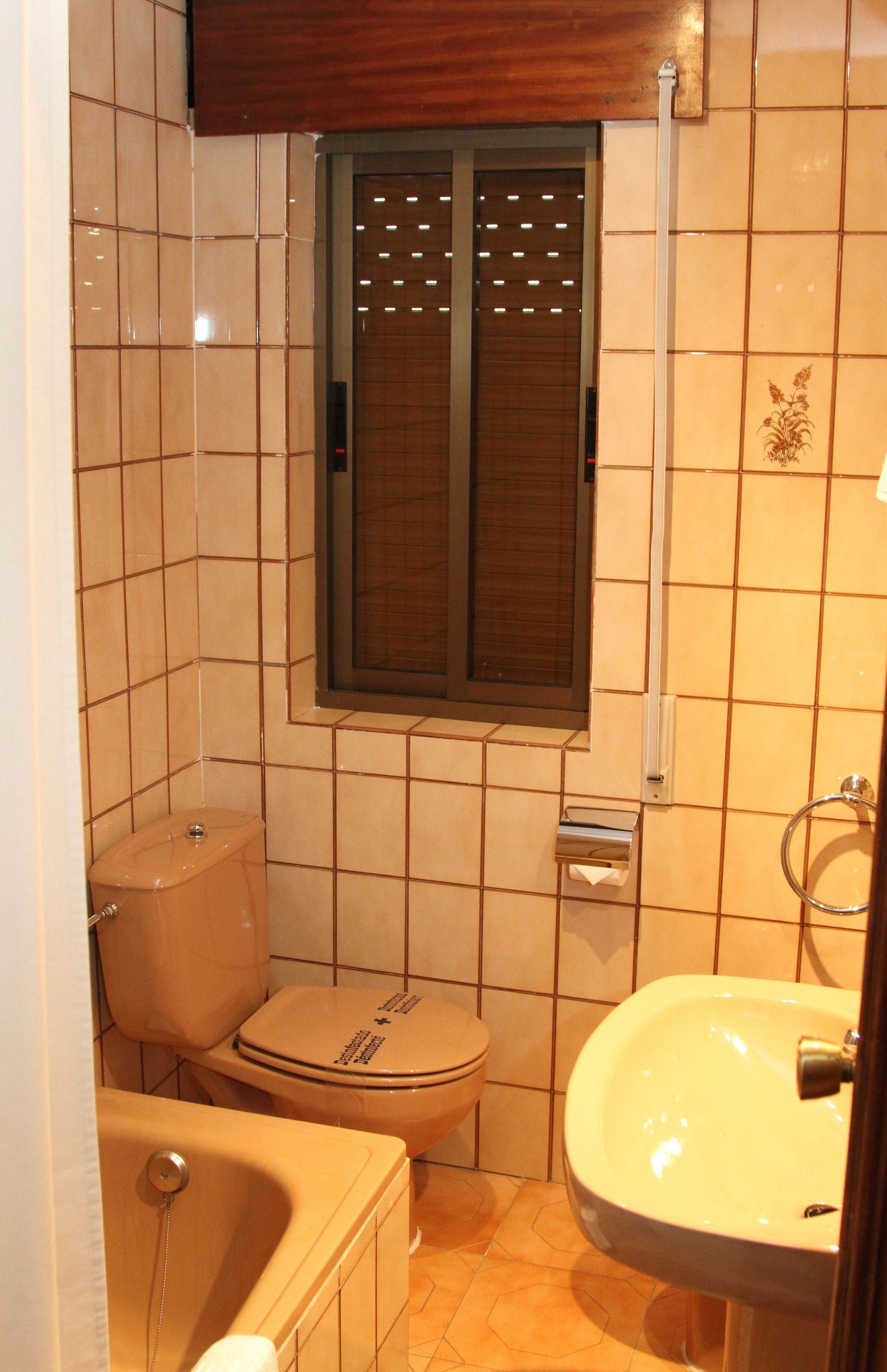 bathtub, designer toiletries, hair dryer, bidet