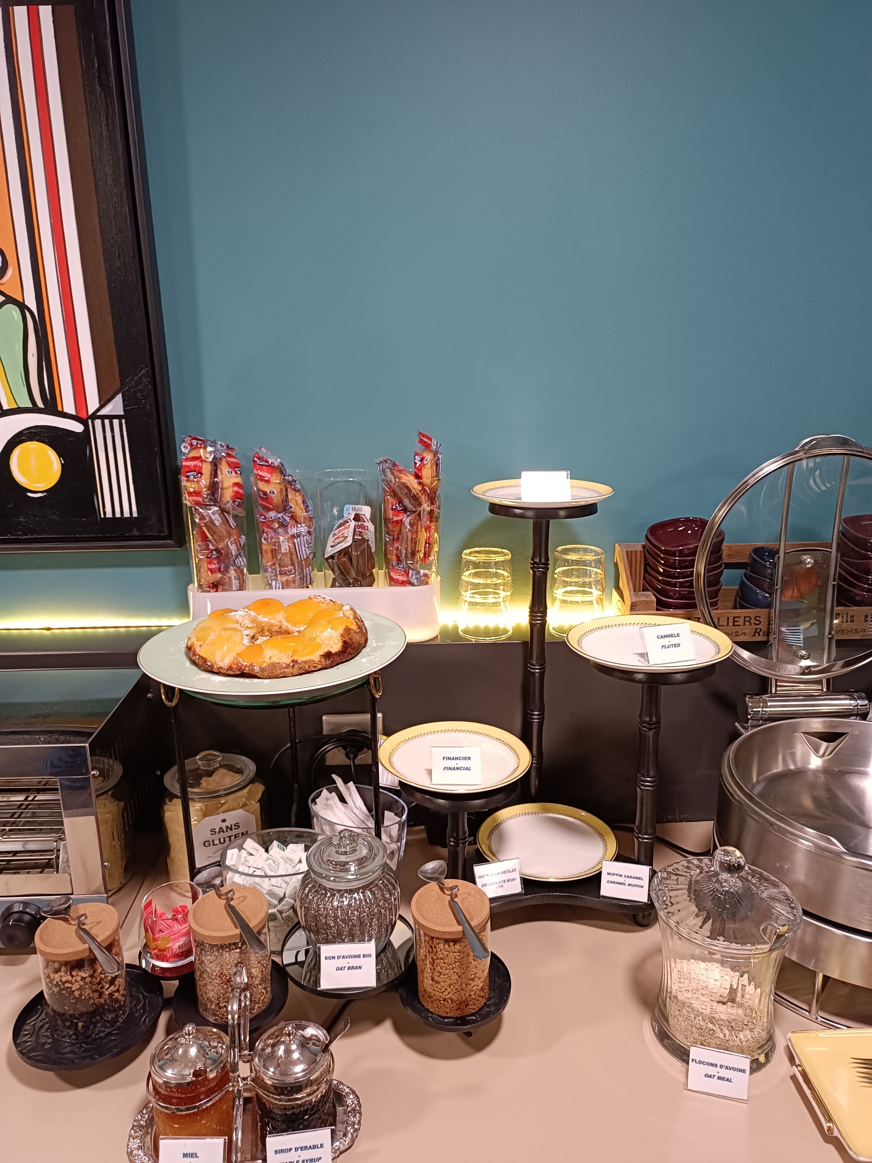 A buffet with various food items and labels, including gluten-free and dairy-free options.
